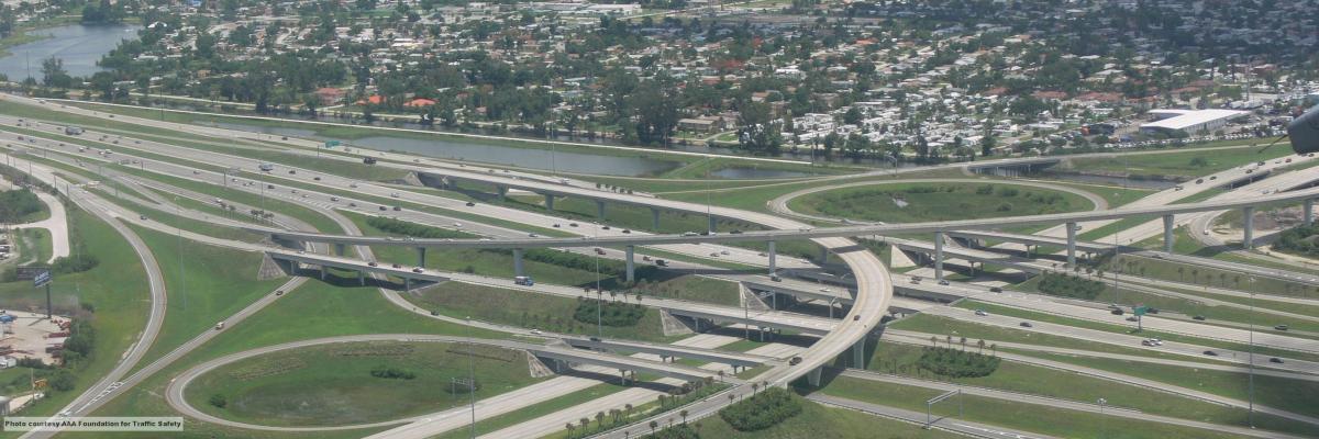 Highway interchange viewed from plane window